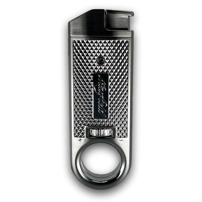 Metallic lighter with textured design on a white background