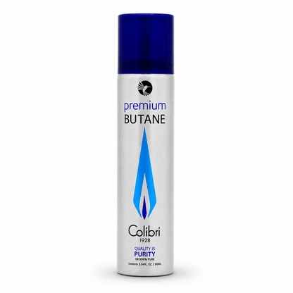 A single aerosol can of Colbri Calibri 1928 Premium Butane gas on a clean white background. The can features a metallic silver body with a dark blue cap and a blue and silver flame graphic.