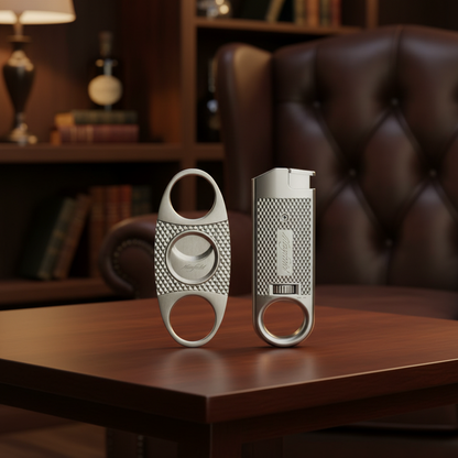 Maxfield cigar cutter and torch lighter on a wooden table with a blurred background.