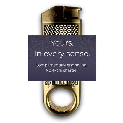 The Maxfield torch lighter with a textured top and a circular ring at the base, shown on a white background with a dark purple text overlay reading 'Yours. In every sense.