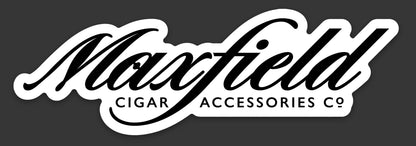 Maxfield Cigar Accessories Co logo on a sticker and a black background.